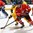 GRAND FORKS, NORTH DAKOTA - APRIL 23: Canada's Dante Fabbro #4 and Sweden's Rickard Hugg #15 battle for position during semifinal round action at the 2016 IIHF Ice Hockey U18 World Championship. (Photo by Matt Zambonin/HHOF-IIHF Images)

